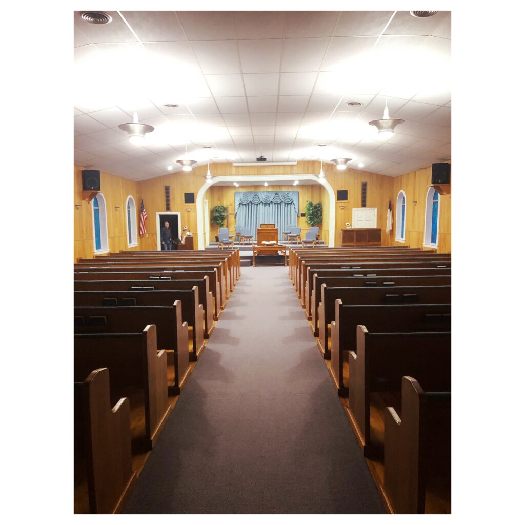 Empty church pews at Woodrow Baptist Church Lubbock Texas