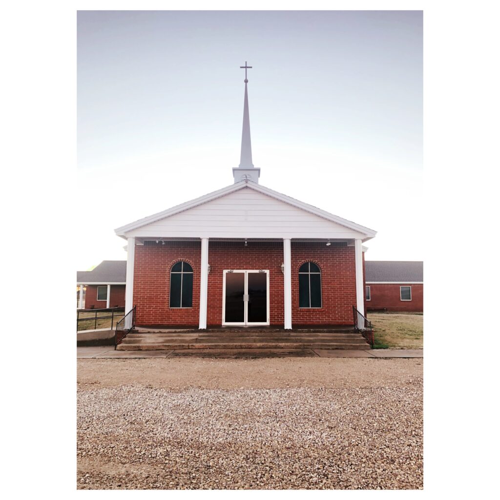 Front of Woodrow Baptist Church Lubbock Texas with white border